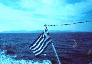 Flag on Boat leaving Crete