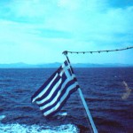 Flag on Boat leaving Crete